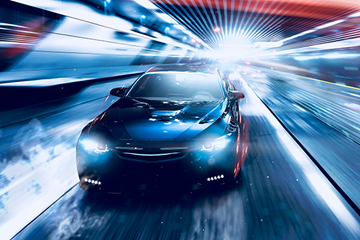 Car in tunnel with lights